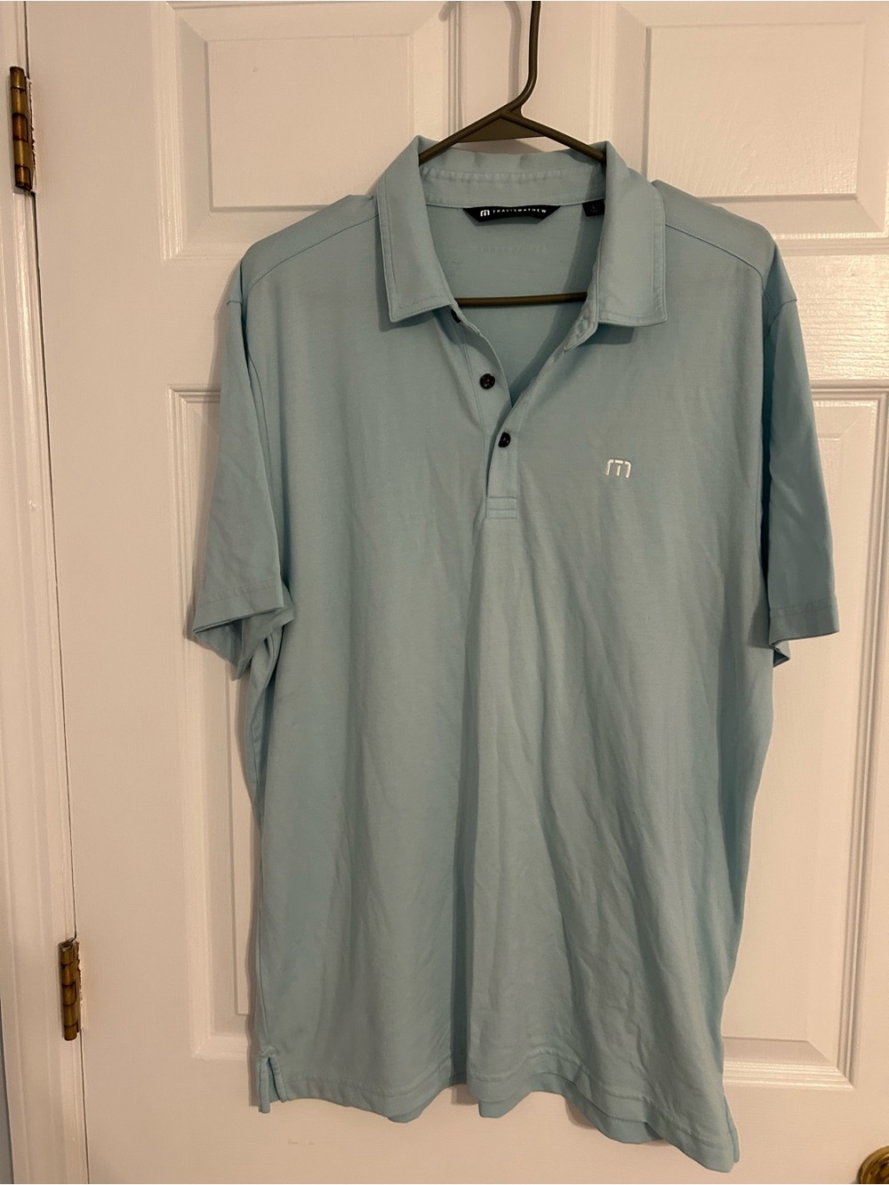 Travis Mathew Men’s Pale Blue Polo Shirt